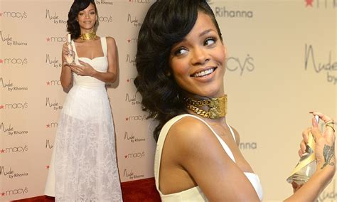 Rihanna Looks Picture Of Innocence As She Launches New Perfume Nude Wearing A Chris Brown
