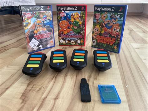 4 PlayStation 2 Buzzer Mit 3 Spielen Kaufen Auf Ricardo