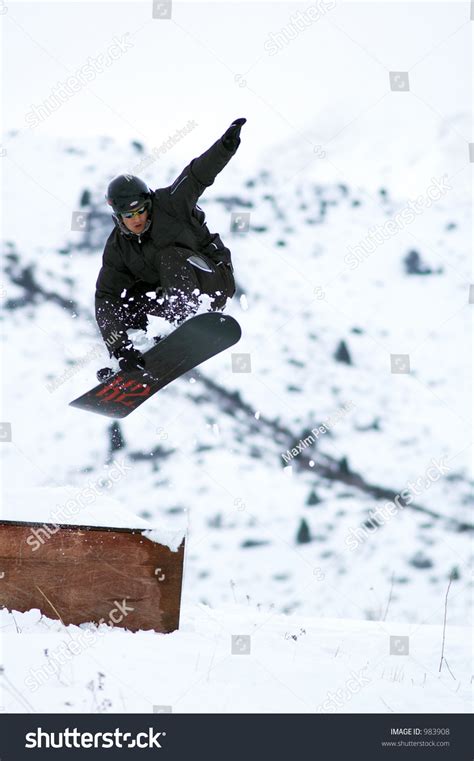 Black Snowboarder Fly Stock Photo 983908 Shutterstock