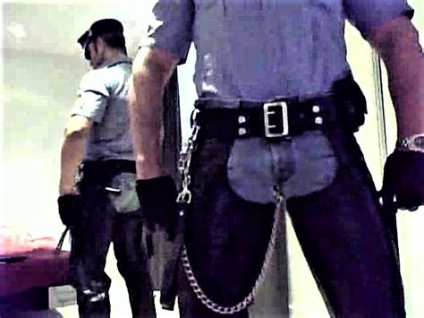 LEATHER MASTER HORNY BRIT LEATHER COP STUD CHAINS YANKS HIS COCK ThisVid