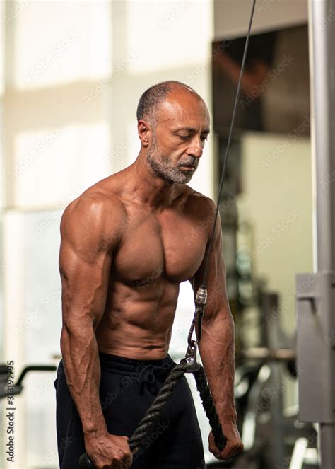 Muscular Shirtless Mature Older Bodybuilding Athlete With Balding Gray