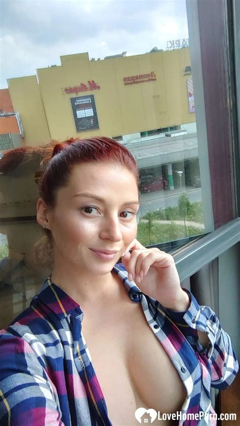 Gorgeous Redhead Shows Off Her Big Tits Her Tattoos While Taking Nudes CoedCherry