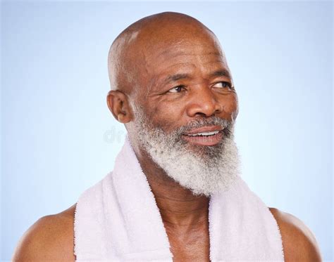 Mature Black Man And Skincare With Towel In Studio From Shower Cleaning And Wellness For Anti