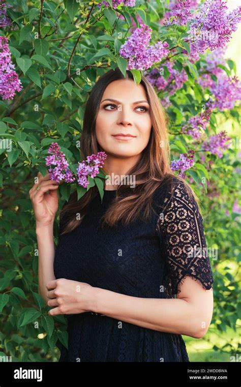 Spring Portrait Of Beautiful Brunette Woman Wearing Black Lace Dress Stock Photo Alamy