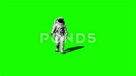 Astronaut Walking On The Green Screen And Saluting Stock Footage Ad