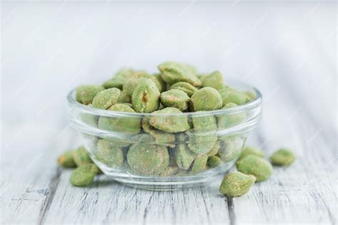 Premium Photo | Portion of wasabi peanuts 