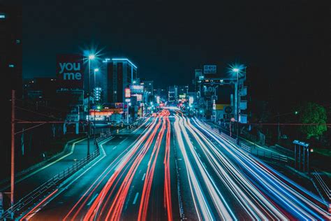 vehicle  road  high rise building time lapse photography