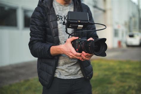 Person Shooting A Video Stock Photo At Vecteezy