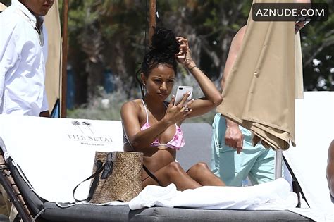 Karrueche Tran Sexy In A Skimpy Pink Bikini While Enjoying A Beach Day In Miami With Her NFL
