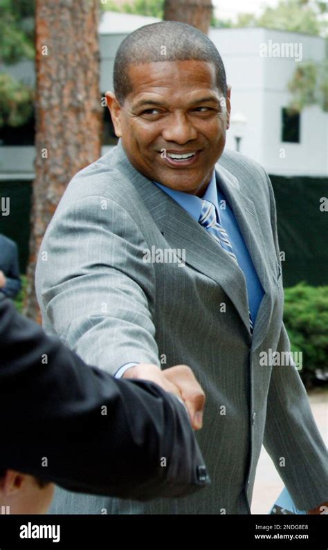 Former UCLA star Marques Johnson arrives for a memorial service arrives ...