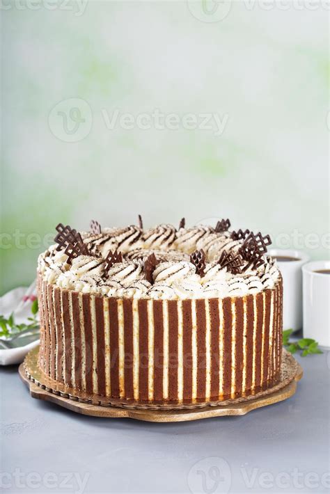 Tiramisu cake with chocolate decor 15751981 Stock Photo at Vecteezy