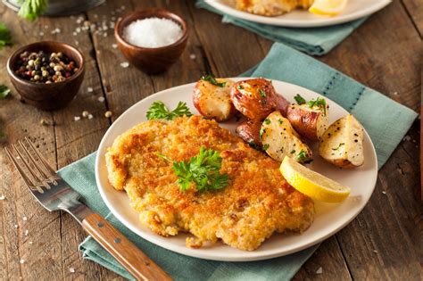 Crispy Pork Schnitzel With Roasted Red Potatoes And Mustard Dill Sauce