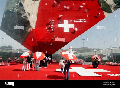 The Mirror Reflective Facade Of The Switzerland Pavilion In The