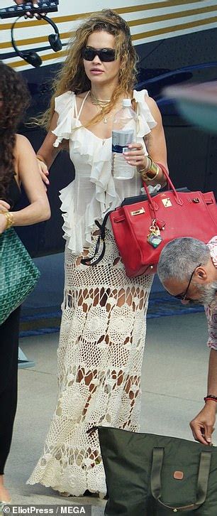 Rita Ora Showcases Her Jaw Dropping Figure In Black Bikini And Floral Cover Up In St Barts