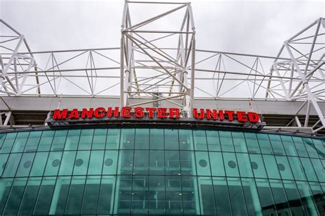 Manchester United Iconic Football Stadium Entrance With Large Red Sign