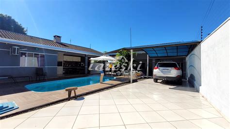 Casa a venda piscina área gourmet 4 quartos sendo 2 suítes no