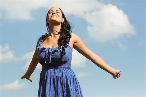 Premium Photo Pretty Brunette In Dress Enjoying The Sunshine