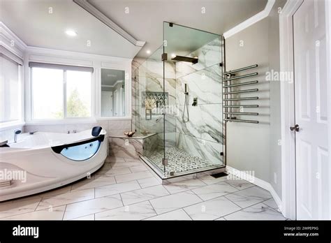 Spacious Modern Contemporary Master Bathroom With Jacuzzi Hot Tube And Large Glass Walk In