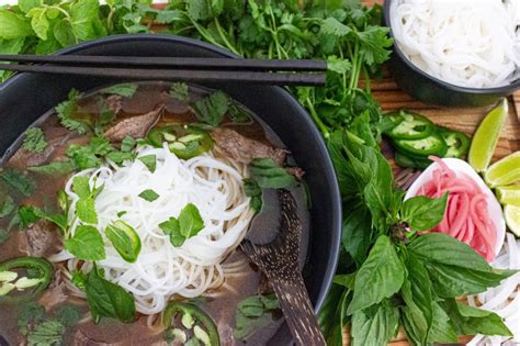 Hearty And Authentic Vietnamese Beef Pho With Flank Steak Cakes