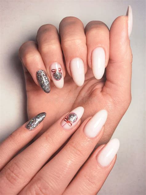 Delicate Pink Gel Polish On Long Nails With A Silver Design Nude Manicure With A Brilliant