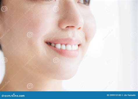 Young Smiling and Showing Her Teeth Stock Photo - Image of smiling, smile: 299913130