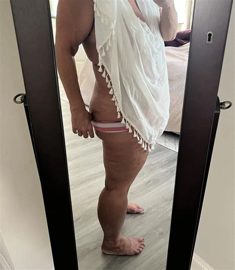 The Real Deal MILF Using A Sarong To Dress Up And Tease Nude Pics