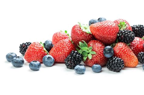 Premium Photo | Fresh tasty berry mix isolated