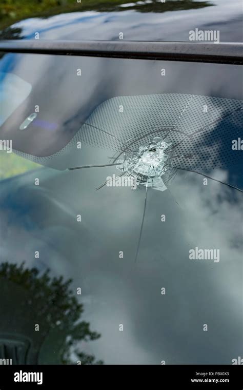 Cracked Windscreen Caused By A Stone Stock Photo Alamy