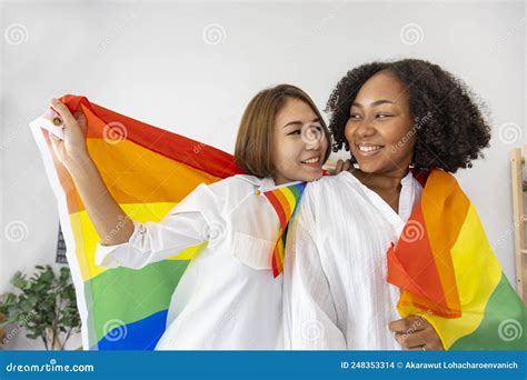 Couple Of Same Sex Marriage From Difference Races Holding Lgbtq Rainbow