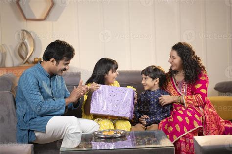 pleasant family celebrating raksha bandhan festival  stock