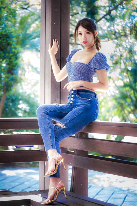 Asian Sitting Suitcase Jeans Blouse D Colletage Smile Glance