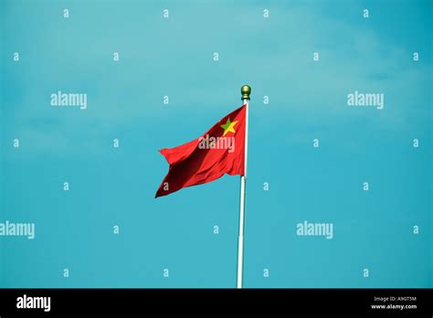 Chinese Flag On Blue Sky Stock Photo Alamy