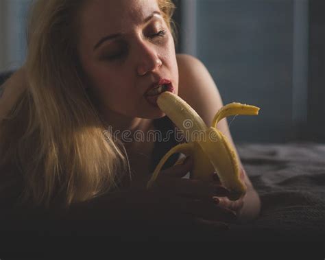 The Blonde Imitates Oral Sex And Sucks A Banana Stock Image Image Of Inside Expression
