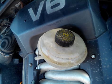 Где находится бачок гидроусилителя ауди а6 - 95 фото