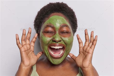 Emotional Obese Brunette Woman Exclaims Loudly Keeps Mouth Widely Opened Raised Palms Has