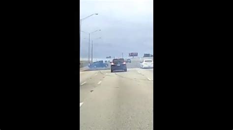 Wild moment drag racer loses control and skids across the motorway ...
