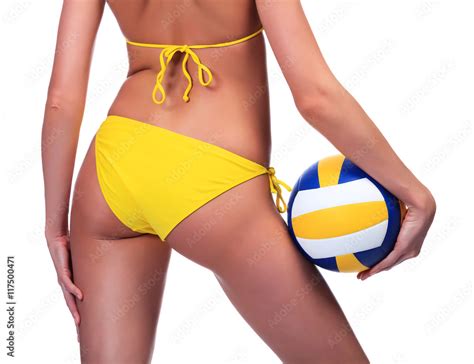 Sexy Woman In Yellow Bikini Holds A Ball Isolated On A White Ba Stock Photo Adobe Stock