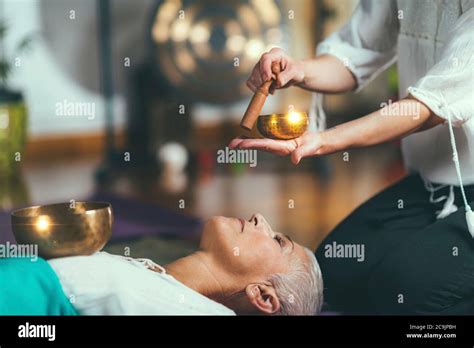 Tibetan Singing Bowl In Sound Meditation Therapy Stock Photo Alamy