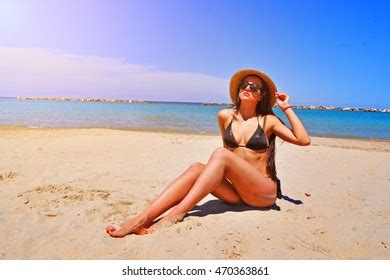 Sexy Brunette Girl Sunbathing On Beach Stock Photo Shutterstock