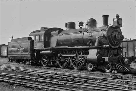 PRR 7002 (4-4-2) class E7SA steam locomotive at an unknown yard, built ...