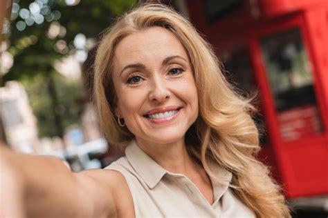 Premium Photo Pretty Blond Caucasian Middleaged Mature Woman Businesswoman Mother Taking