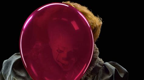 Download Pennywise Alongside A Red Balloon Wallpaper