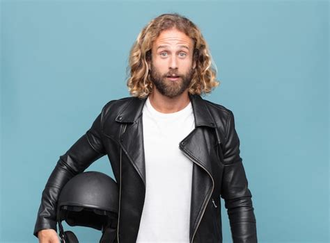 Premium Photo Blonde Man Looking Very Shocked Or Surprised Staring With Open Mouth Saying Wow