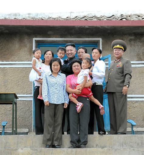 Kim Jong Un Family Photo: North Korean Leader Poses With Terrified ...