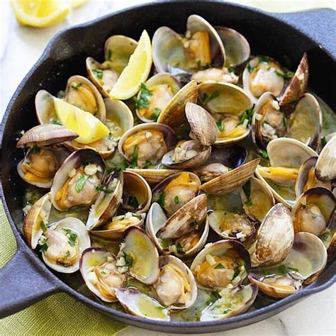 This Sautéed Clams With Garlic And White Wine recipe is featured in the Christmas Eve along with ...