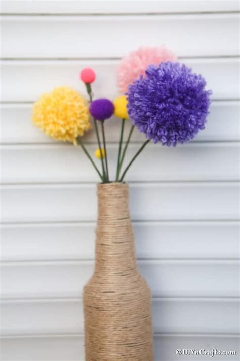 Diy Pom Pom Flowers Bouquet Grab Your Scrap Yarn Glue And Scissors To Throw Together Some Of