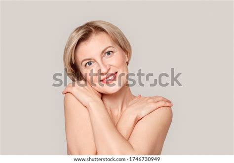 Naked Mature Blonde Woman Standing Isolated Stock Photo 1746730949 Shutterstock