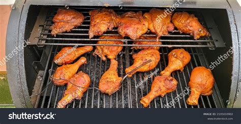Chicken Roasting Smoking Over Pellet Smoker Stock Photo 2105010902