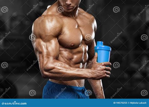 Muscular Man In Gym With Shaker Shaped Abdominal Strong Male Naked Torso Abs Working Out