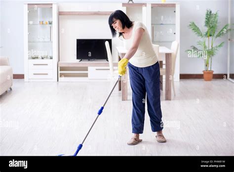 Old Mature Woman Tired After House Chores Stock Photo Alamy